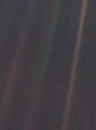 PIA00452: Solar System Portrait - Earth as 'Pale Blue Dot'
