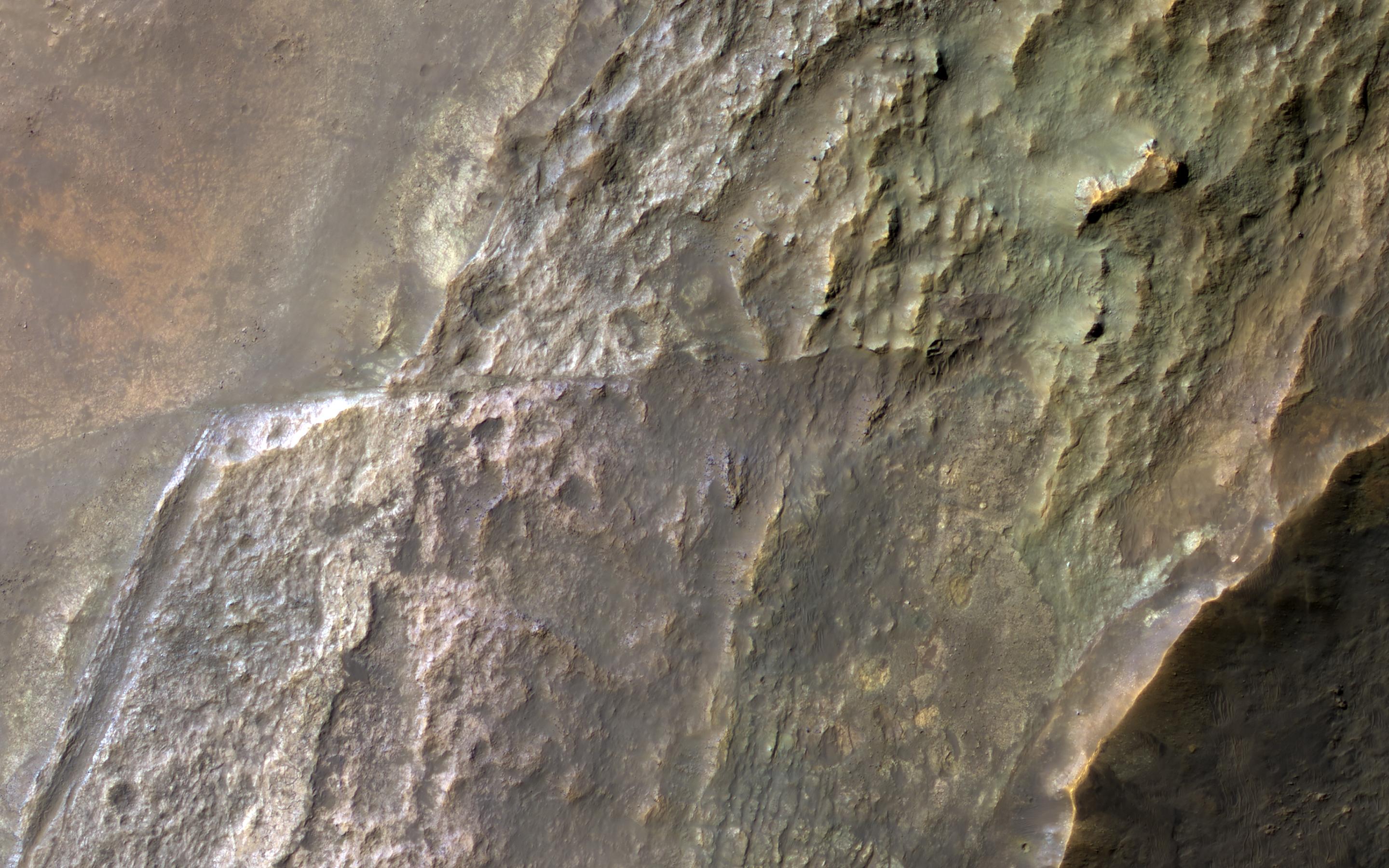 PIA24861: Colorful Layers in a Crater Wall