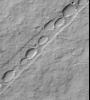 PIA01686: Chain of Pits on Pavonis Mons