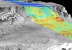 PIA03741: Melas Chasma, Day and Night.