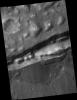 PIA09671: Gullies in Trough near Gorgonum Chaos