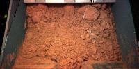 PIA10745: Martian Soil Inside Phoenix's Robotic Arm Scoop