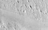 PIA17574: Sinuous Ridge Cutting Across Geologic Units of the Medusae Fossae Formation