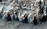 PIA17733: Ice in a Chlorite-Bearing Escarpment in Northwest Hellas