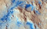 PIA19356: Sinuous Ridge Materials in Reuyl Crater