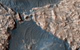 PIA22585: Uplifted Blocks of Light-Toned Layered Deposits